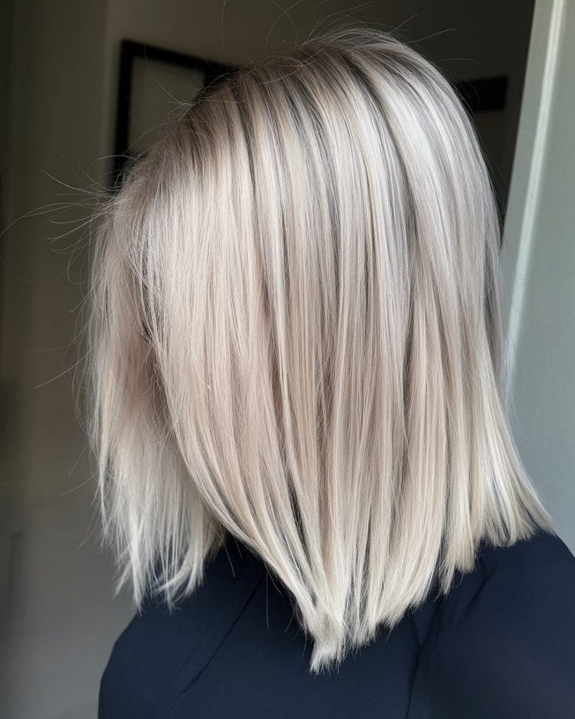 Ash Blonde Perfection with Face-Framing Highlights