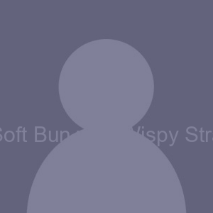 Soft Bun with Wispy Strands