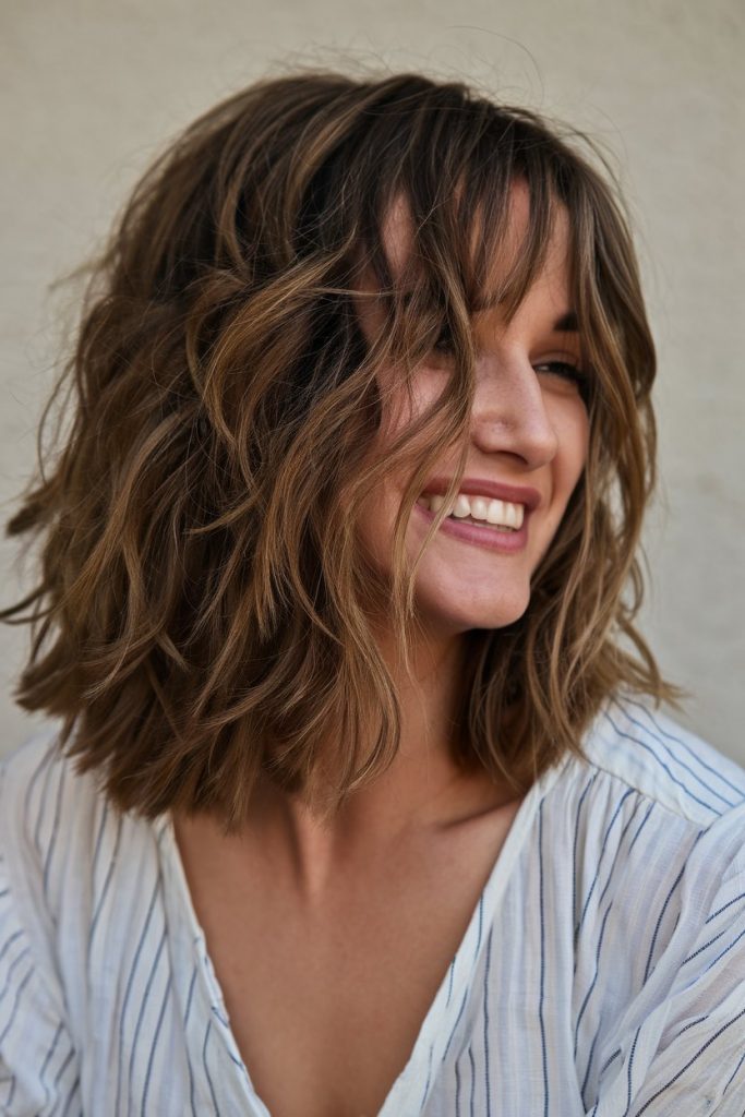 Soft Brown Lob with Face-Framing Highlights